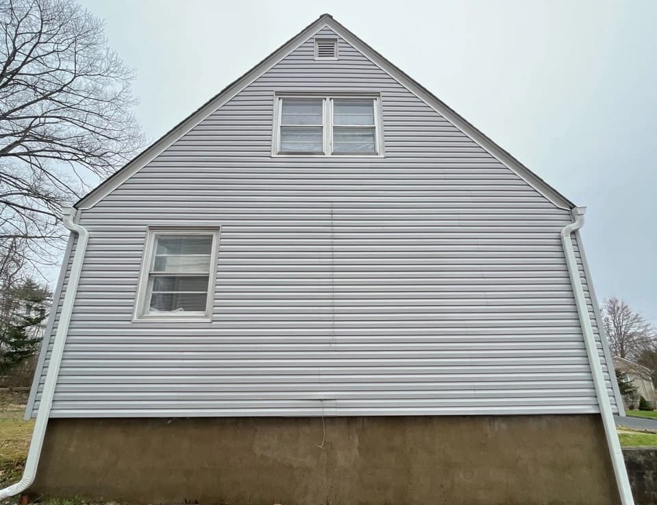 Wickliffe Power Washing technician performing detailed house washing in Wickliffe residential area