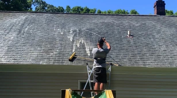 Before and after results of roof washing by Wickliffe Power Washing in Wickliffe